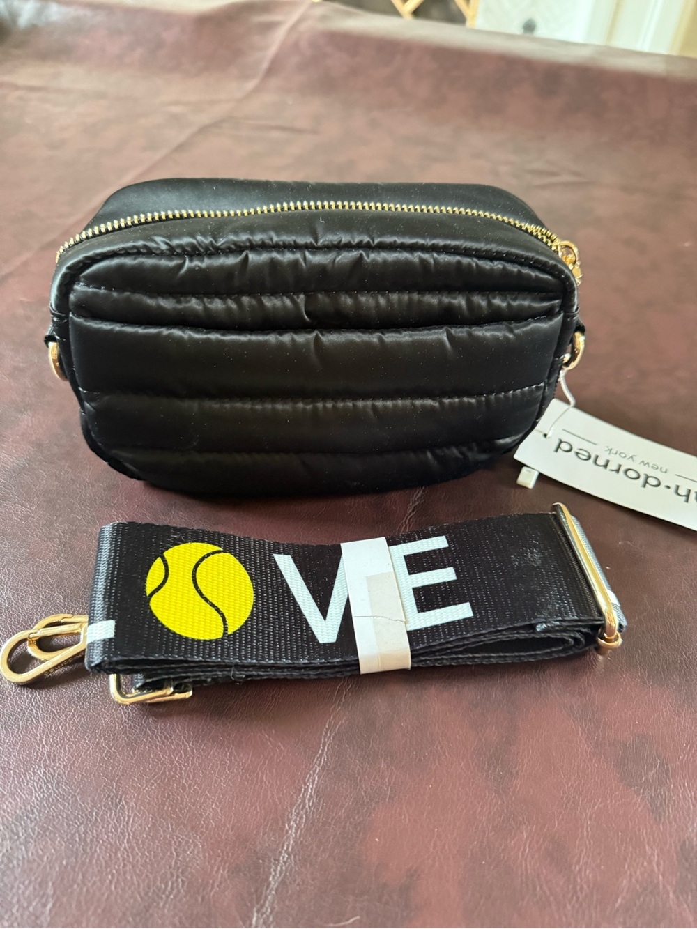 Quilted Black Crossbody Bag with 'LOVE' Tennis Ball Strap